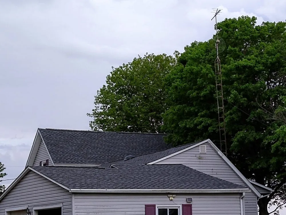 Slide of Peake Roofing