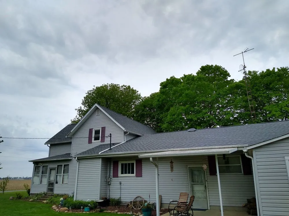 Slide of Peake Roofing