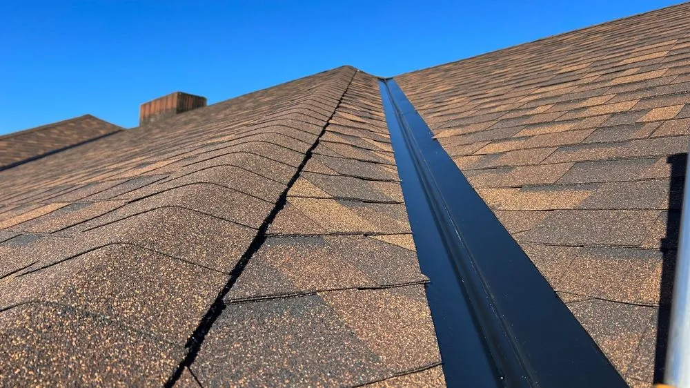 Slide of Peaks and Valleys Roofing