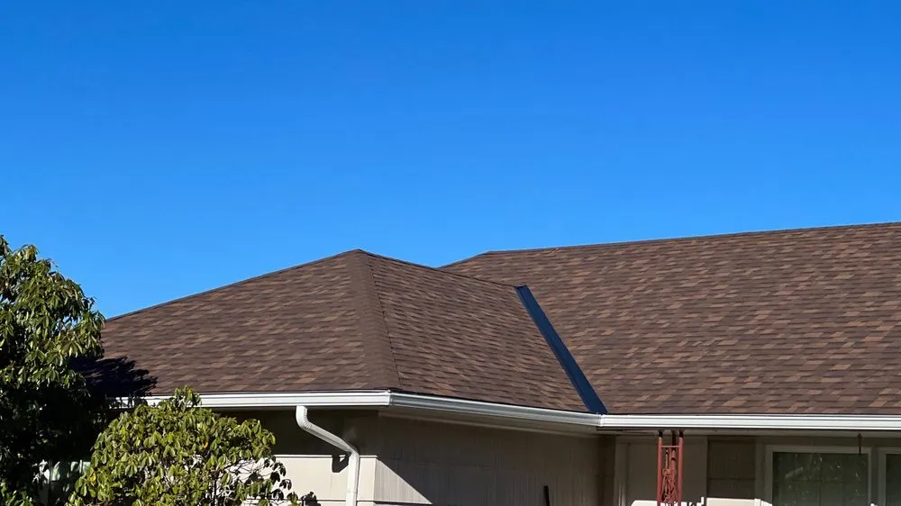 Slide of Peaks and Valleys Roofing