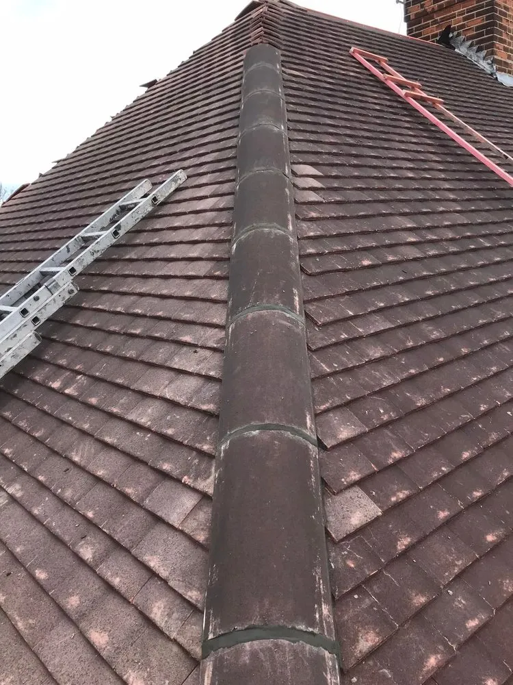 Slide of Pecan Park Roofing