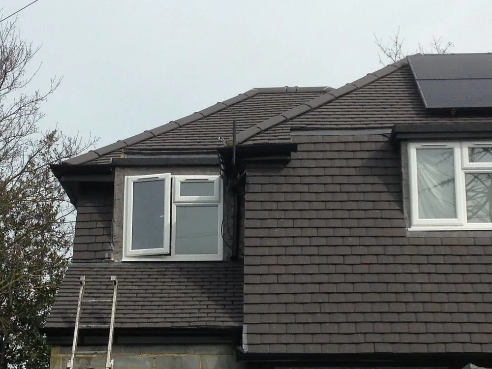 Slide of Pecan Park Roofing