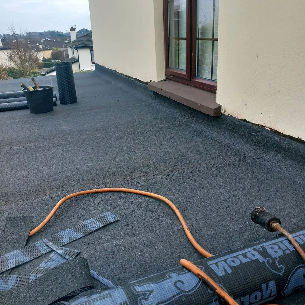 Slide of Pecan Park Roofing