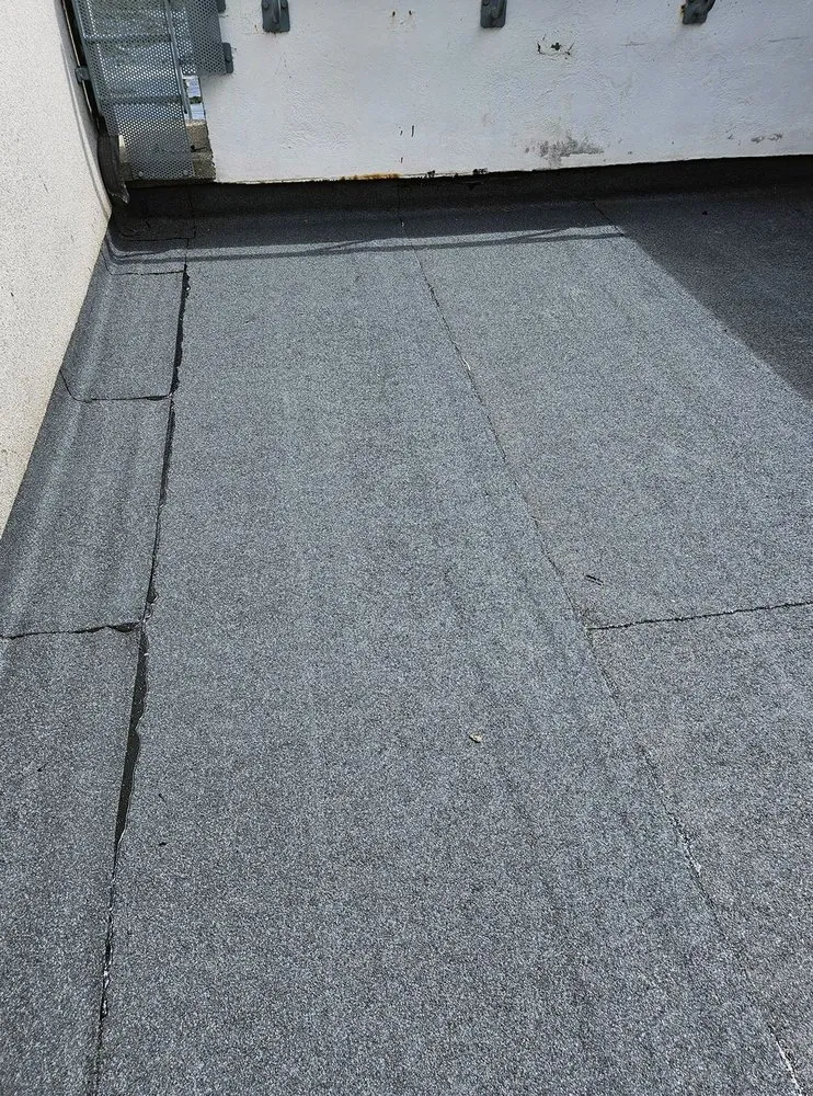 Slide of Pecan Park Roofing