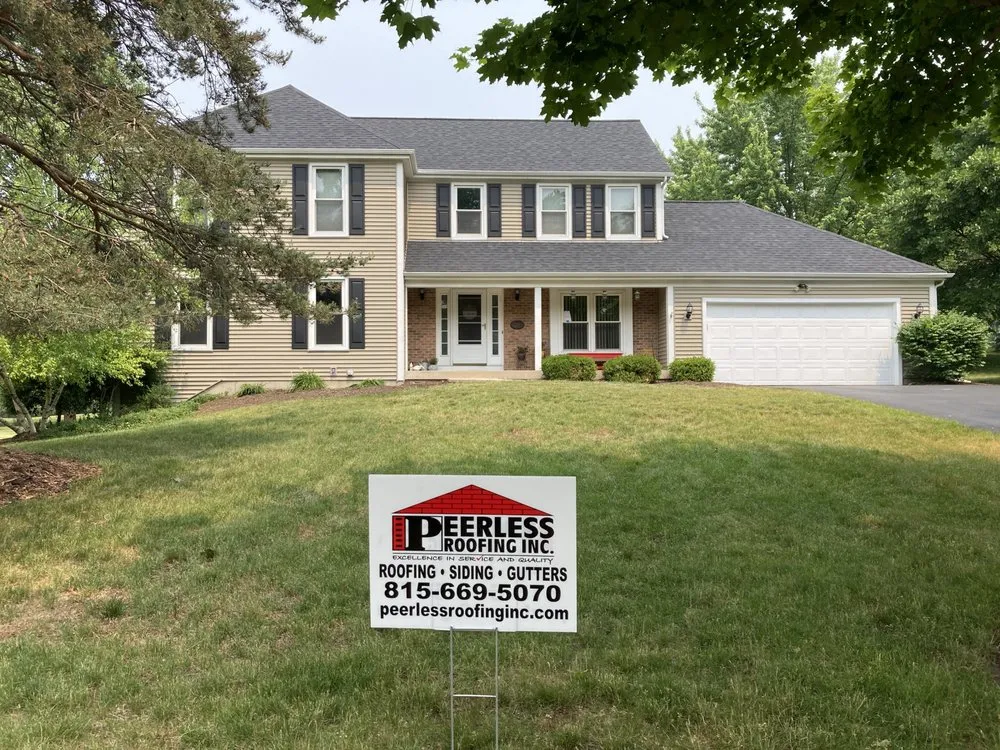 Slide of Peerless Roofing