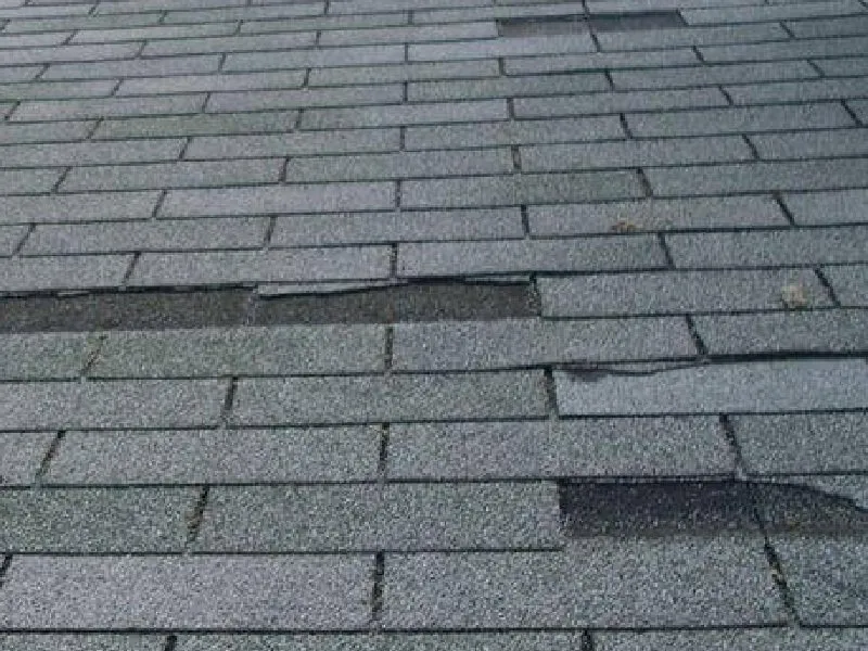 Slide of Peerless Roofing