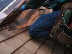 Slide of Peerless Roofing