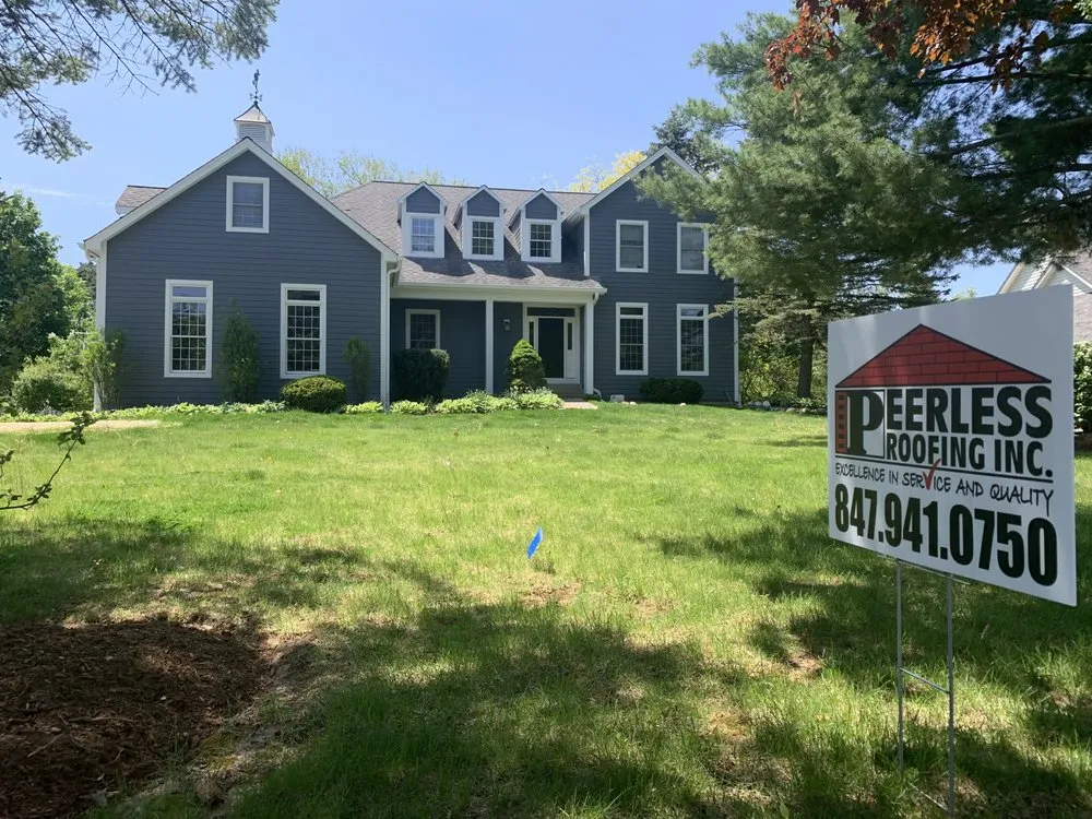 Slide of Peerless Roofing