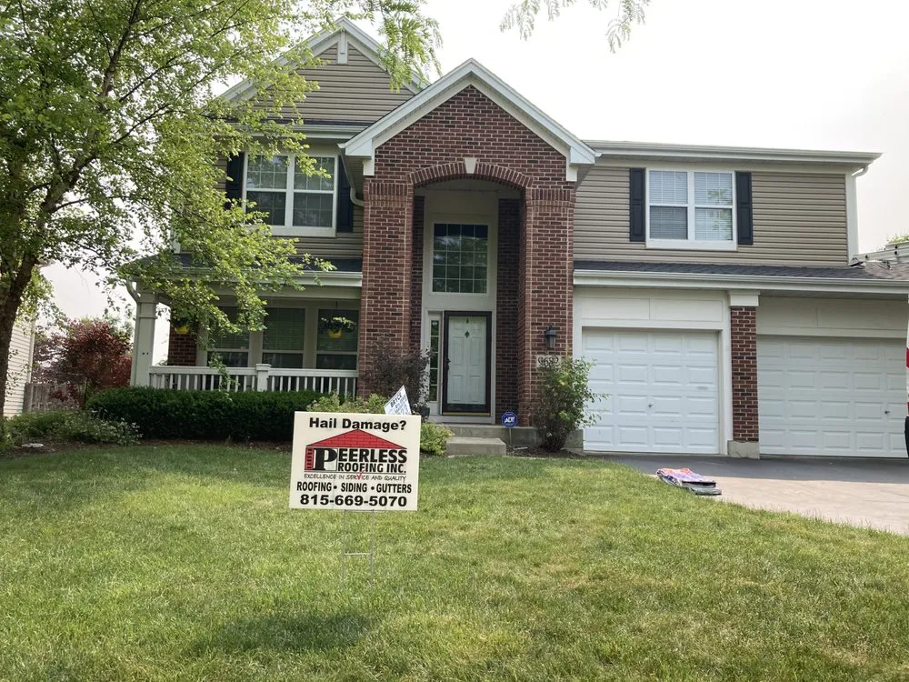 Slide of Peerless Roofing