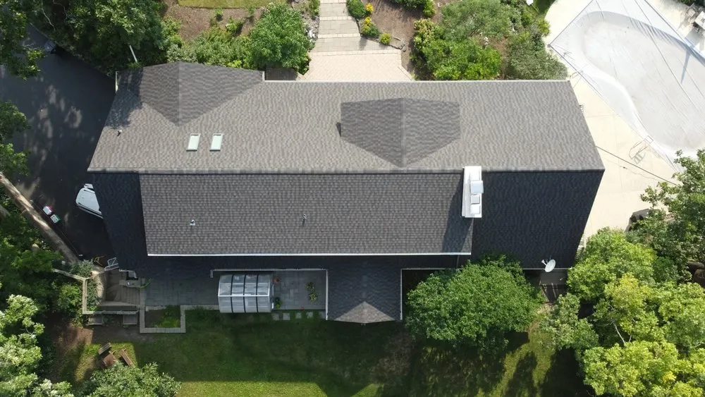 Slide of Peerless Roofing