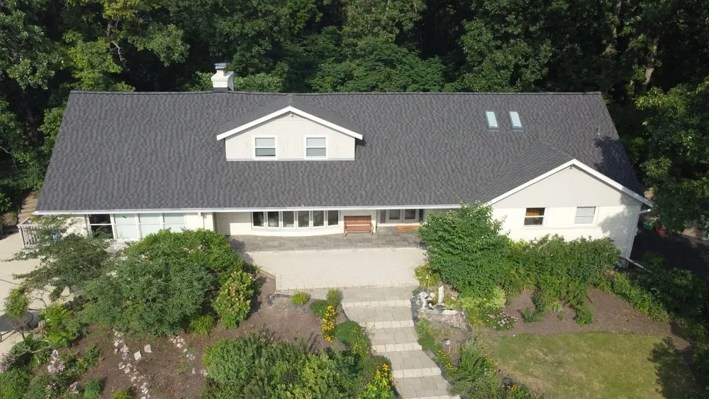 Slide of Peerless Roofing