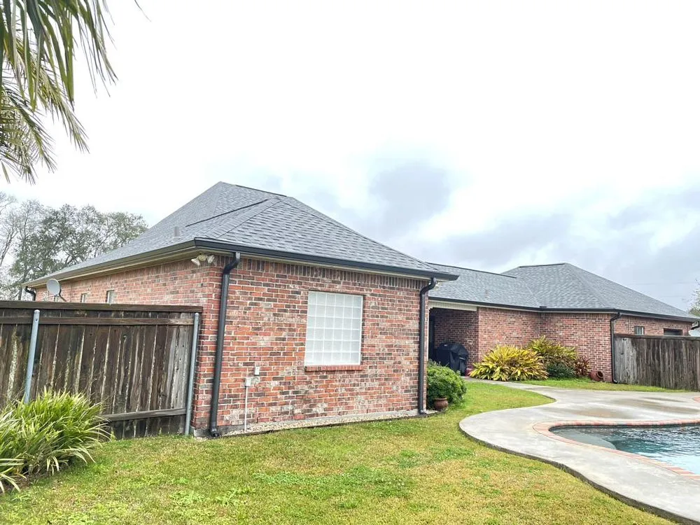 Slide of Pelican Roofing Company