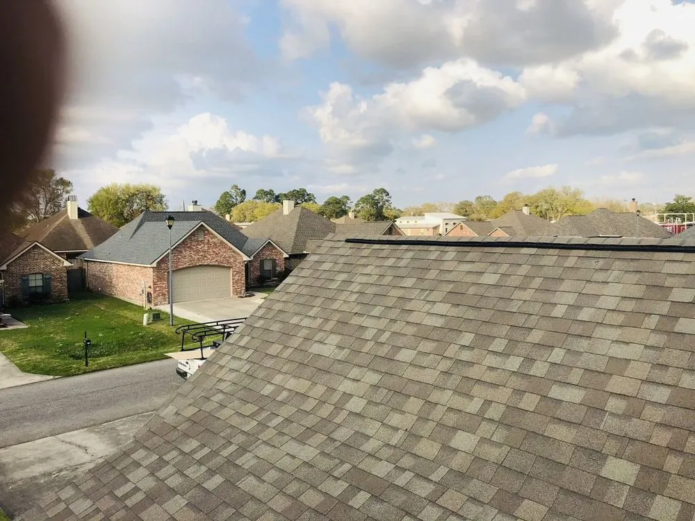 Slide of Pelican Roofing Company