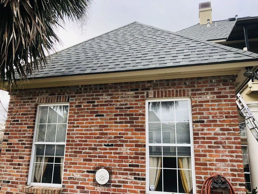 Slide of Pelican Roofing Company