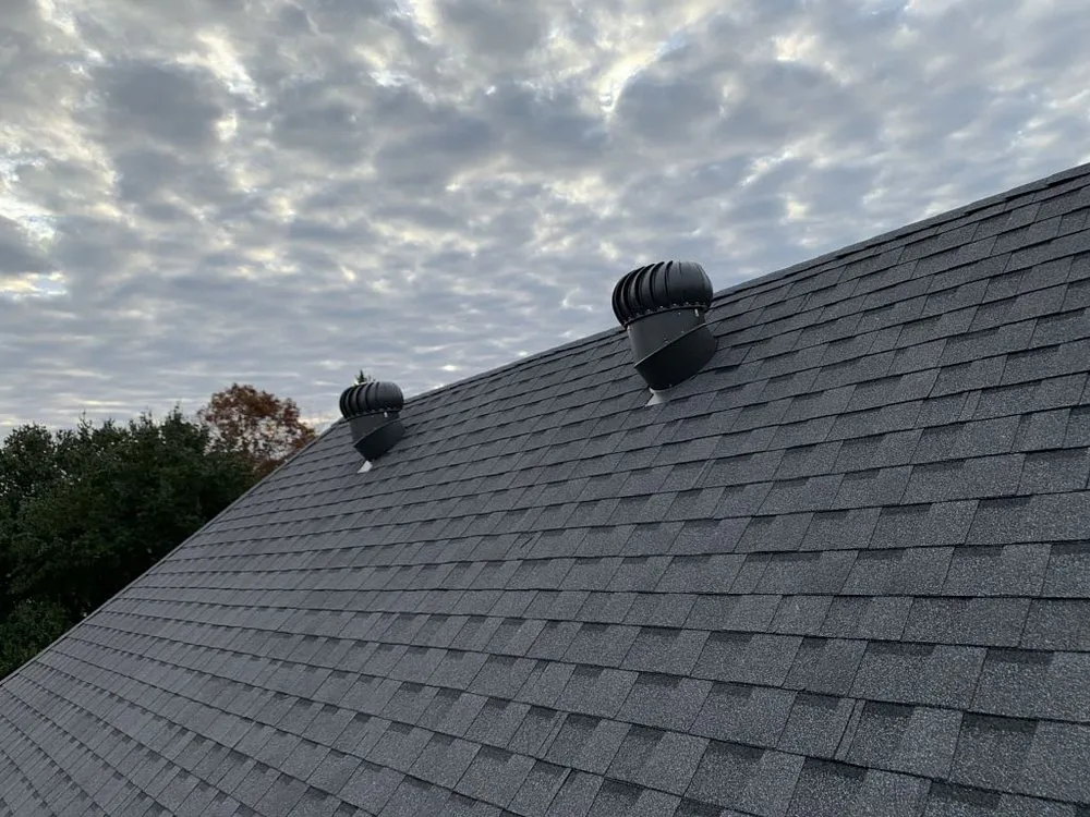 Slide of Pelican Roofing Company