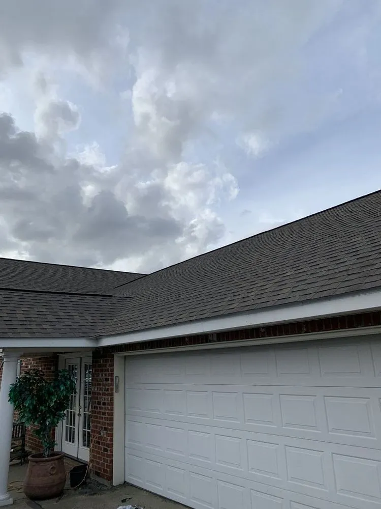 Slide of Pelican Roofing Company