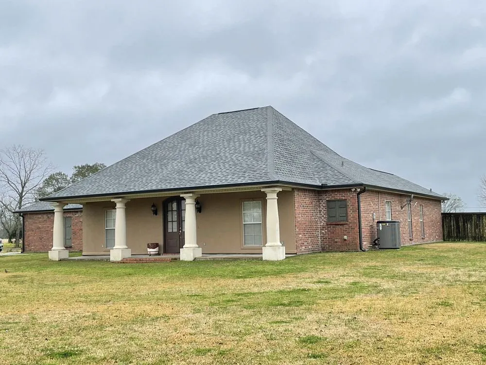 Slide of Pelican Roofing Company