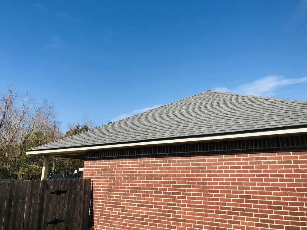 Slide of Pelican Roofing Company