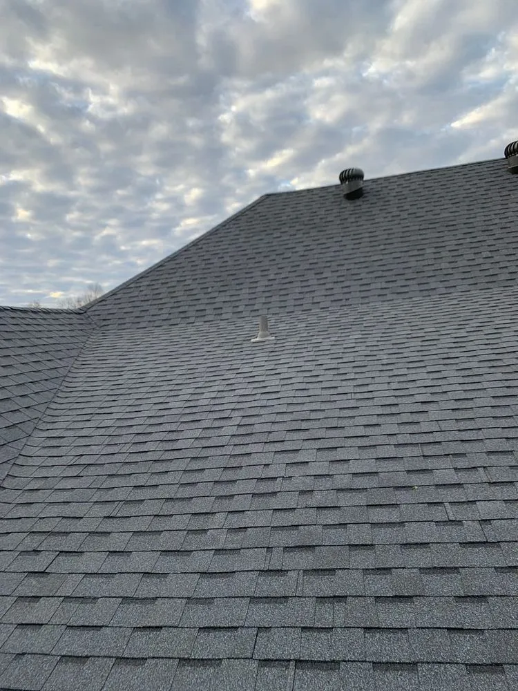 Slide of Pelican Roofing Company