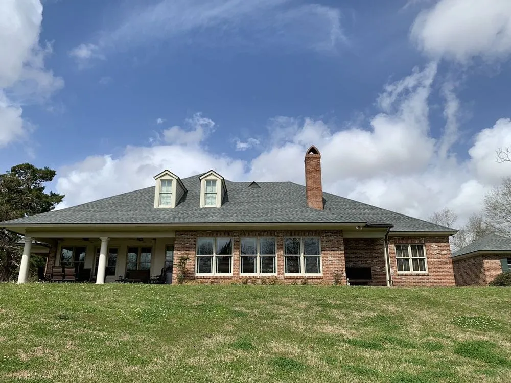 Slide of Pelican Roofing Company