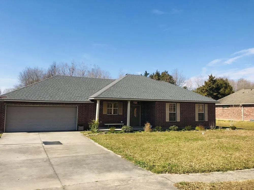 Slide of Pelican Roofing Company