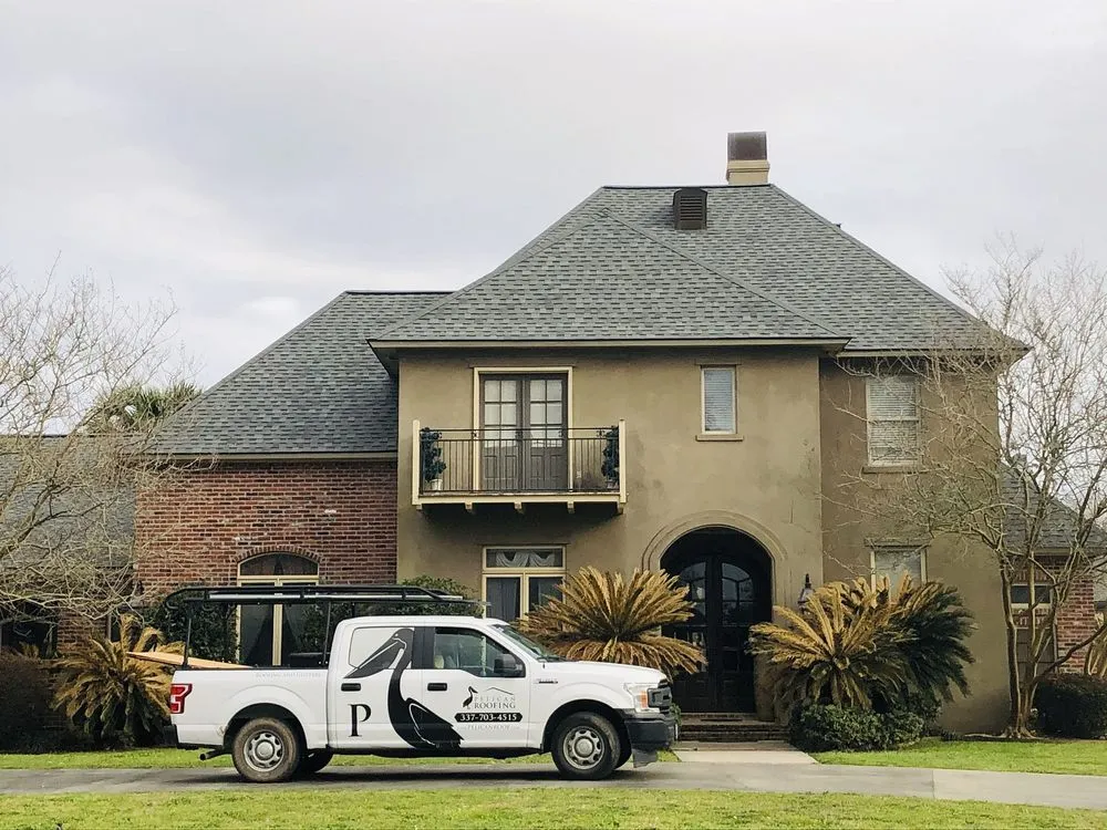 Slide of Pelican Roofing Company
