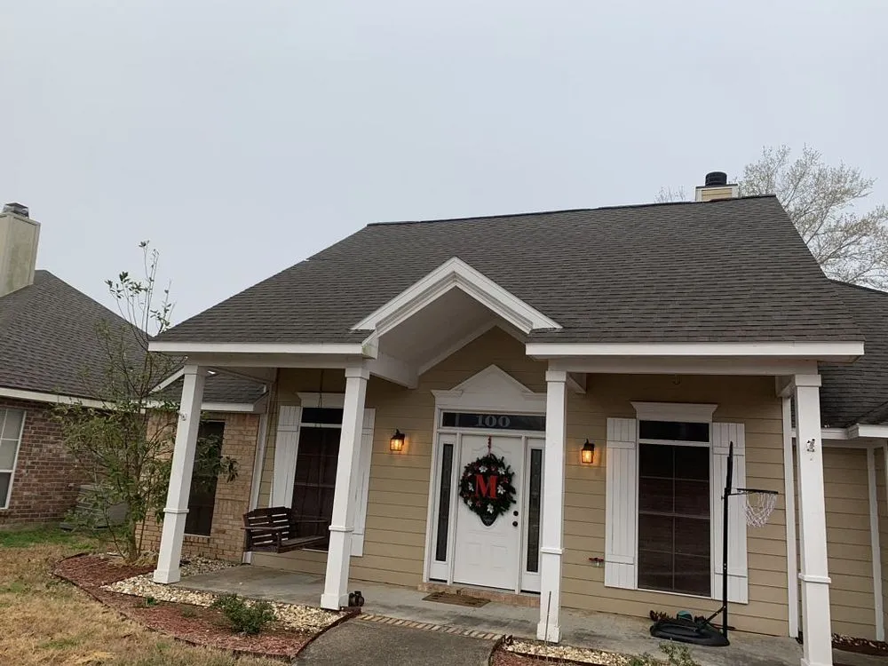 Slide of Pelican Roofing Company