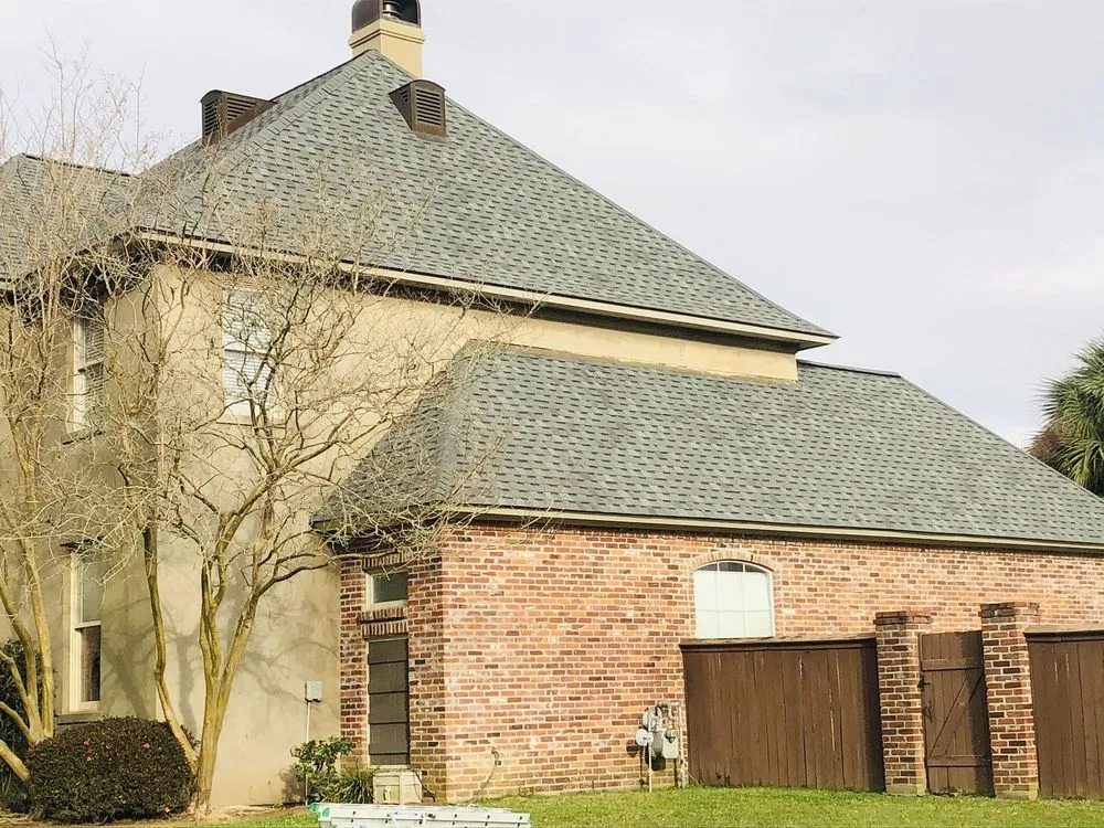 Slide of Pelican Roofing Company