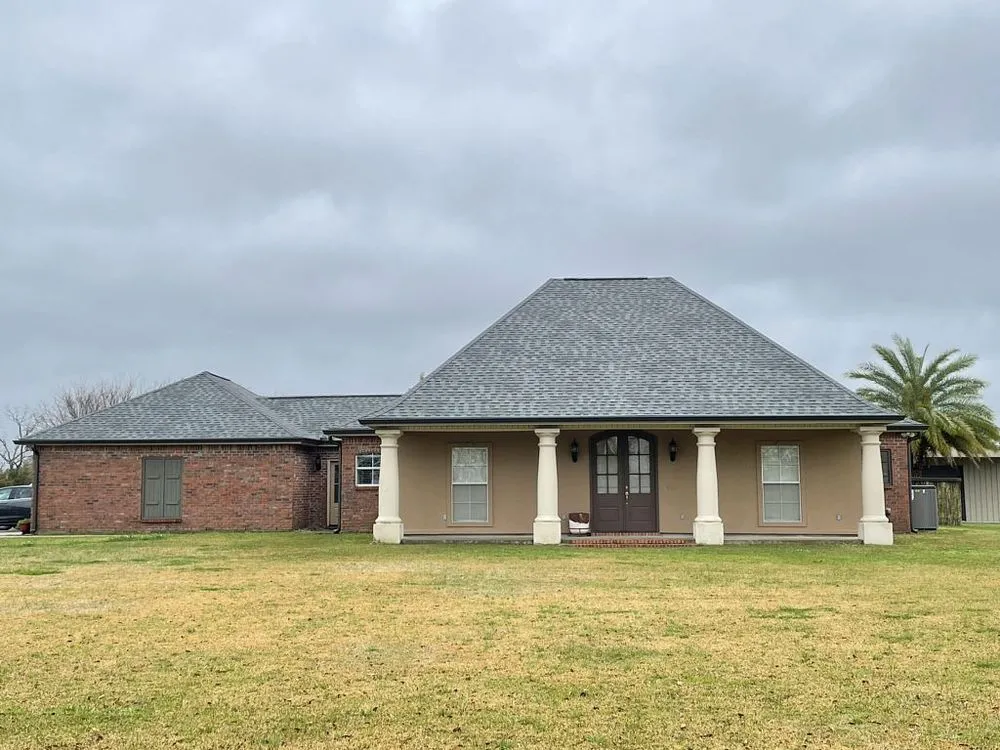 Slide of Pelican Roofing Company