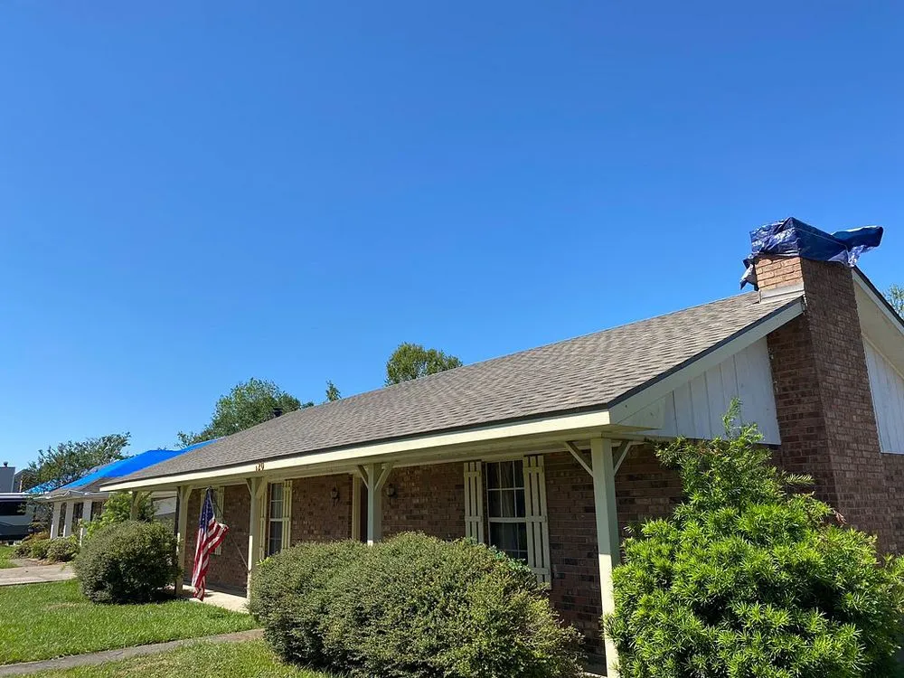 Slide of Pelican Roofing Company