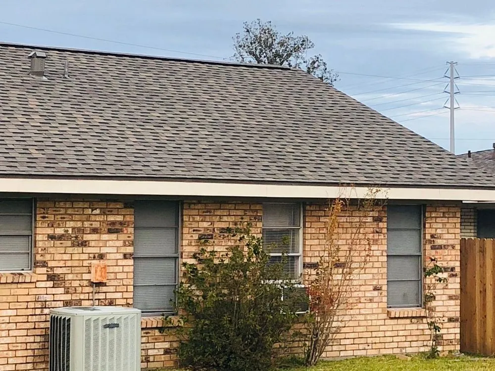 Slide of Pelican Roofing Company