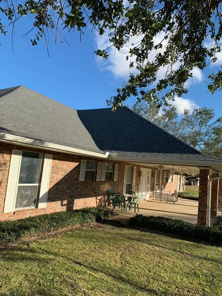 Slide of Pelican Roofing Company