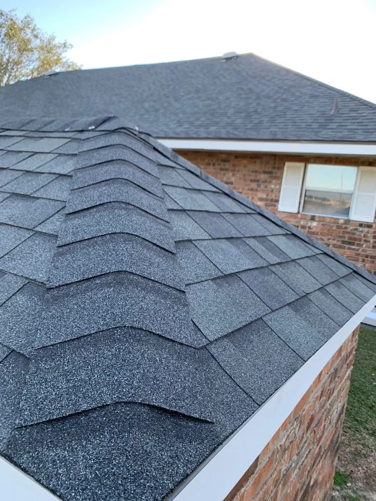 Slide of Pelican Roofing Company