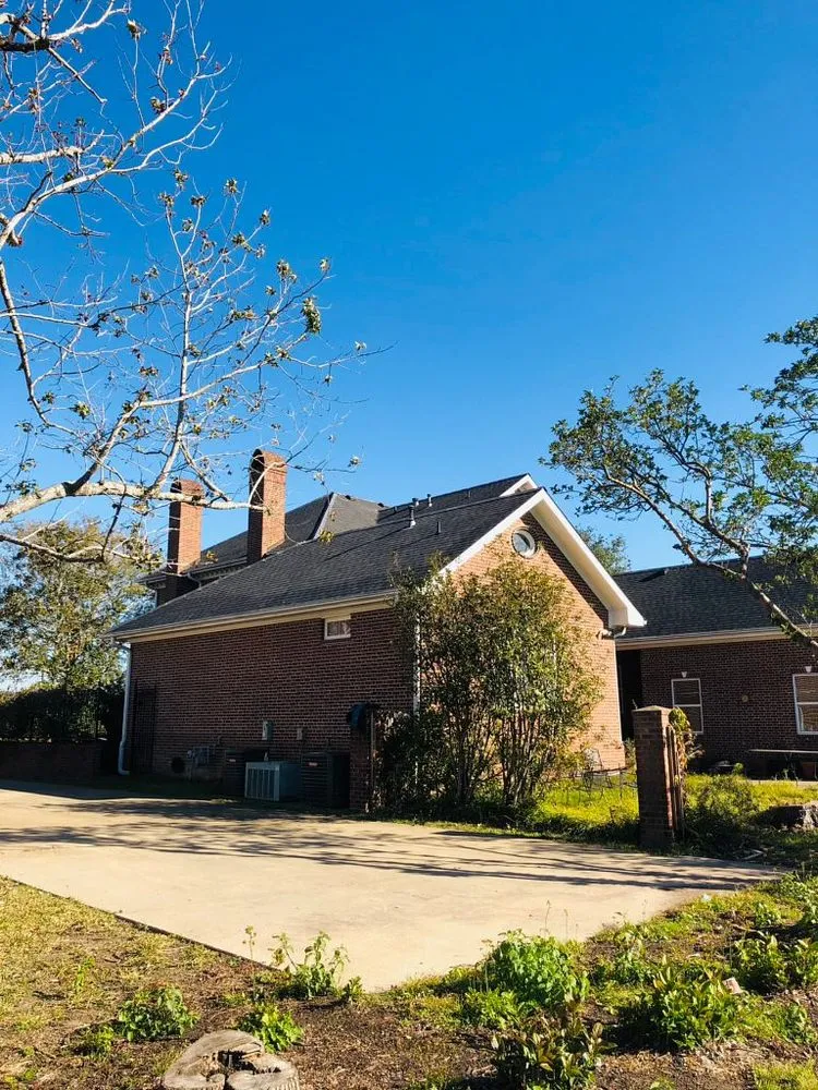 Slide of Pelican Roofing Company