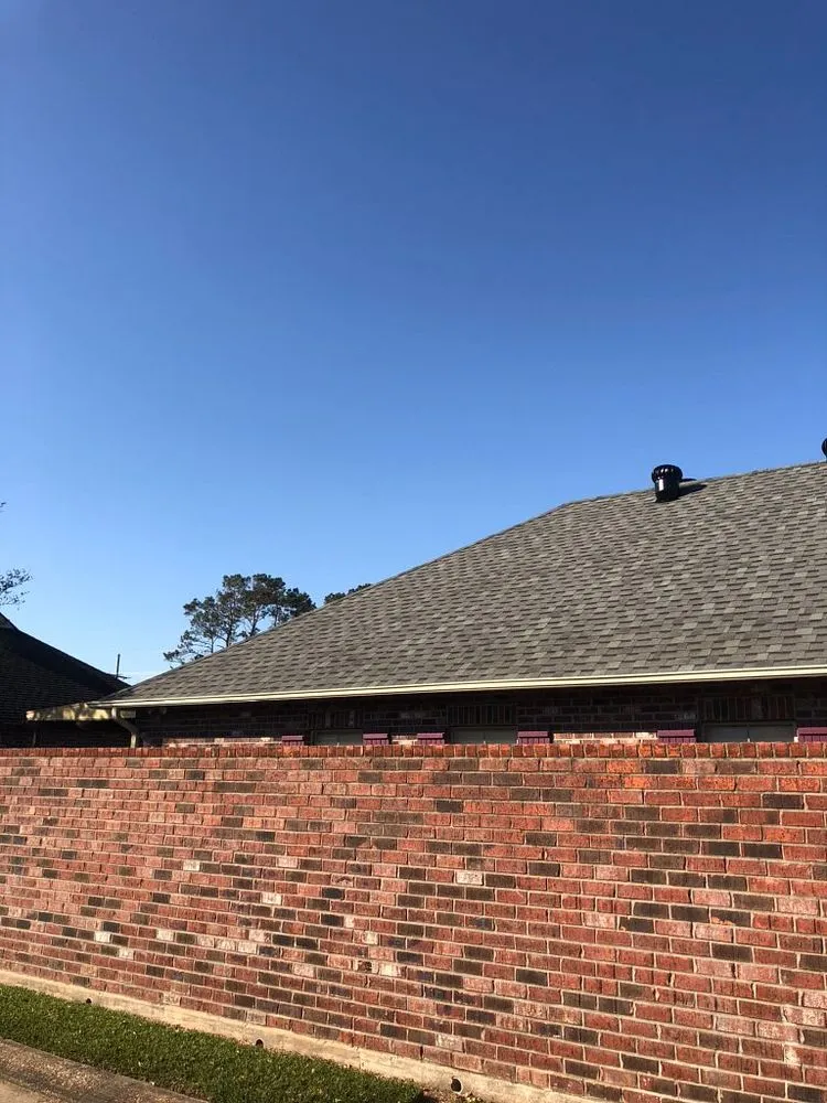 Slide of Pelican Roofing Company