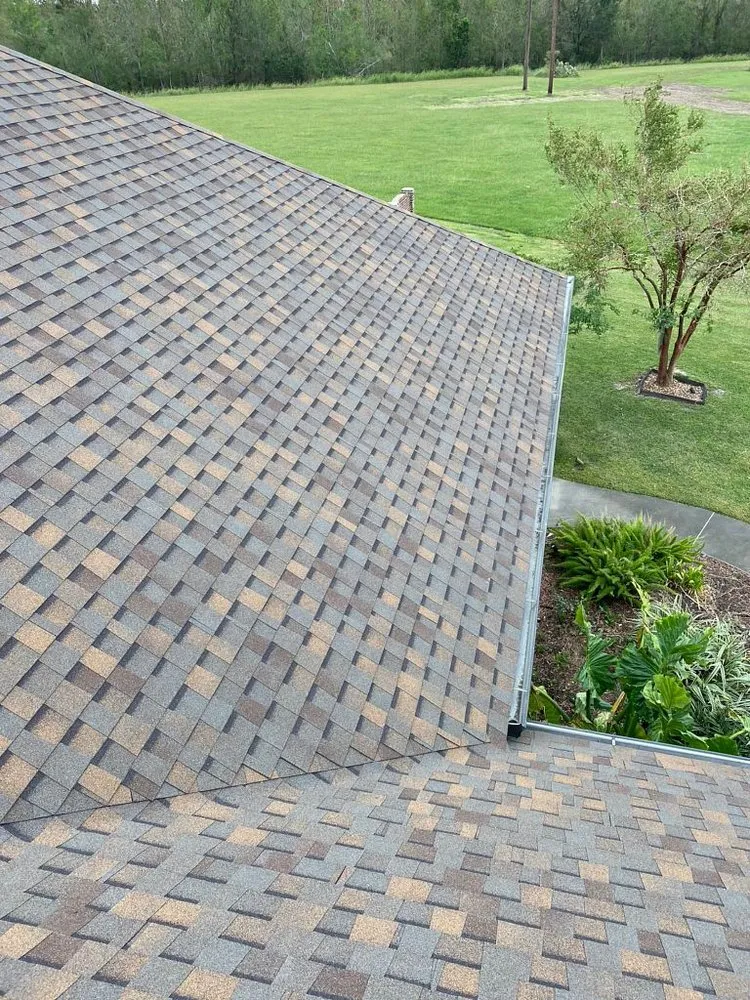 Slide of Pelican Roofing Company