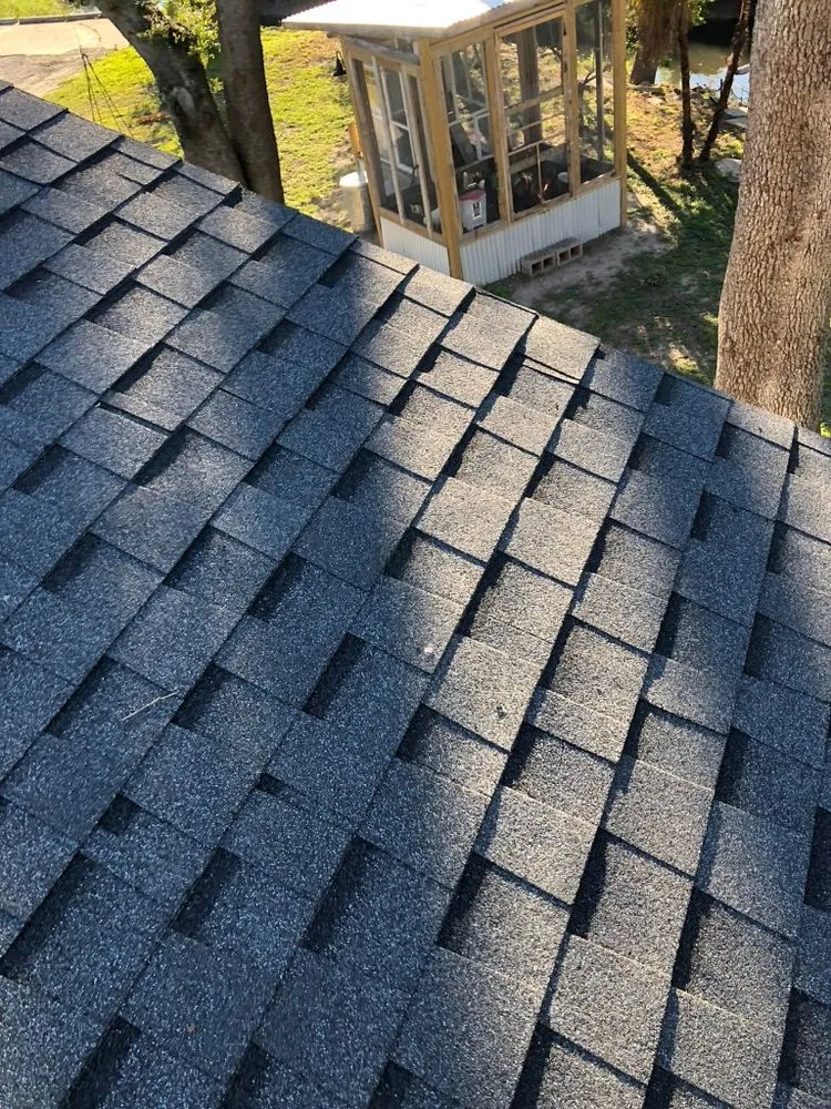 Slide of Pelican Roofing Company