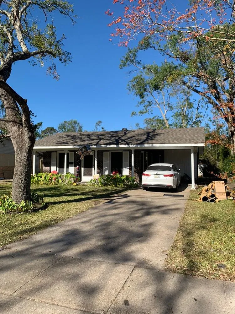 Slide of Pelican Roofing Company
