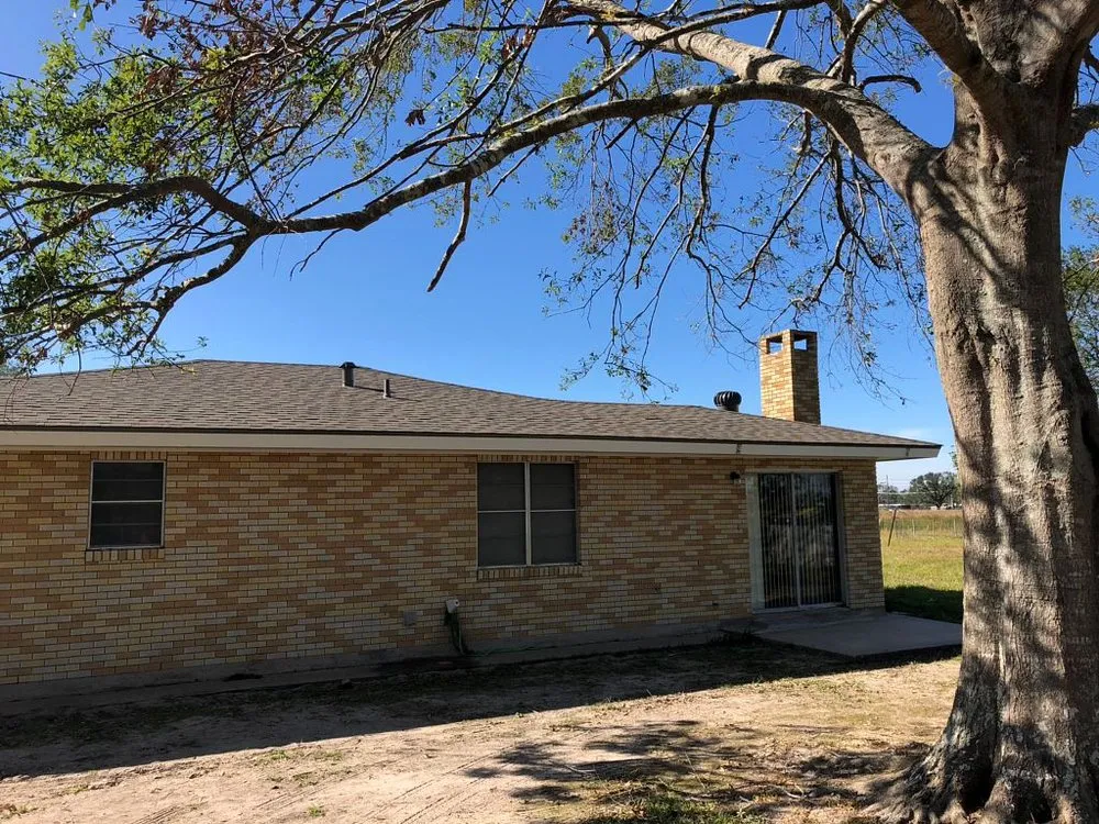 Slide of Pelican Roofing Company