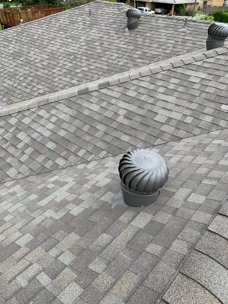 Slide of Pelican Roofing