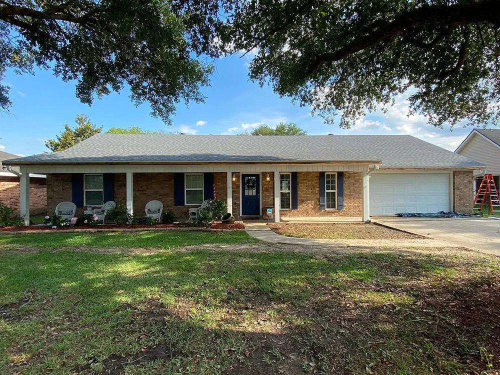 Slide of Pelican Roofing