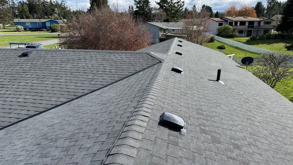 Slide of Peninsula Peaks Roofing