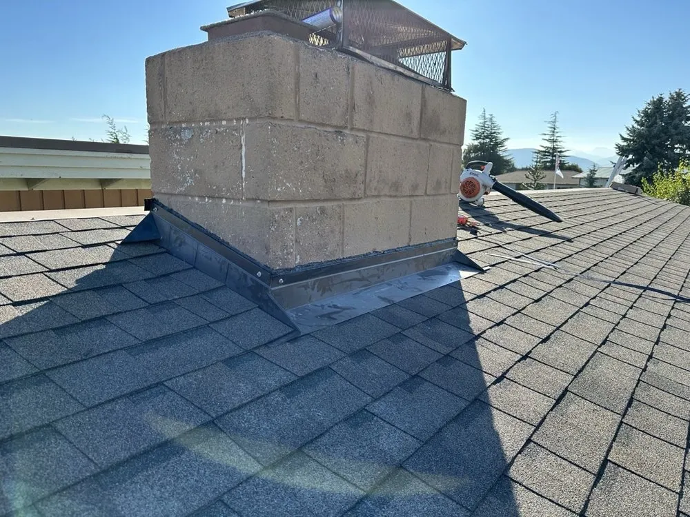 Slide of Peninsula Peaks Roofing