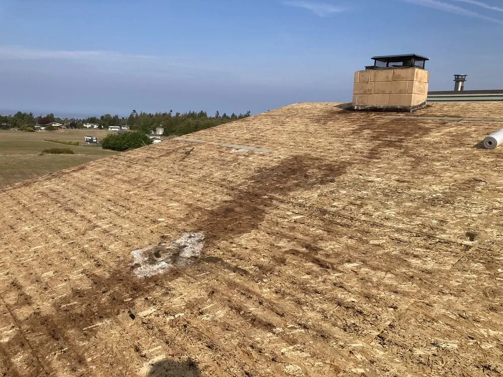 Slide of Peninsula Peaks Roofing