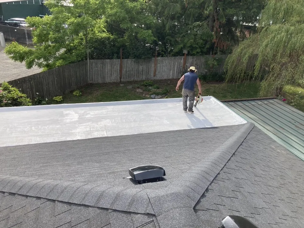 Slide of Peninsula Peaks Roofing