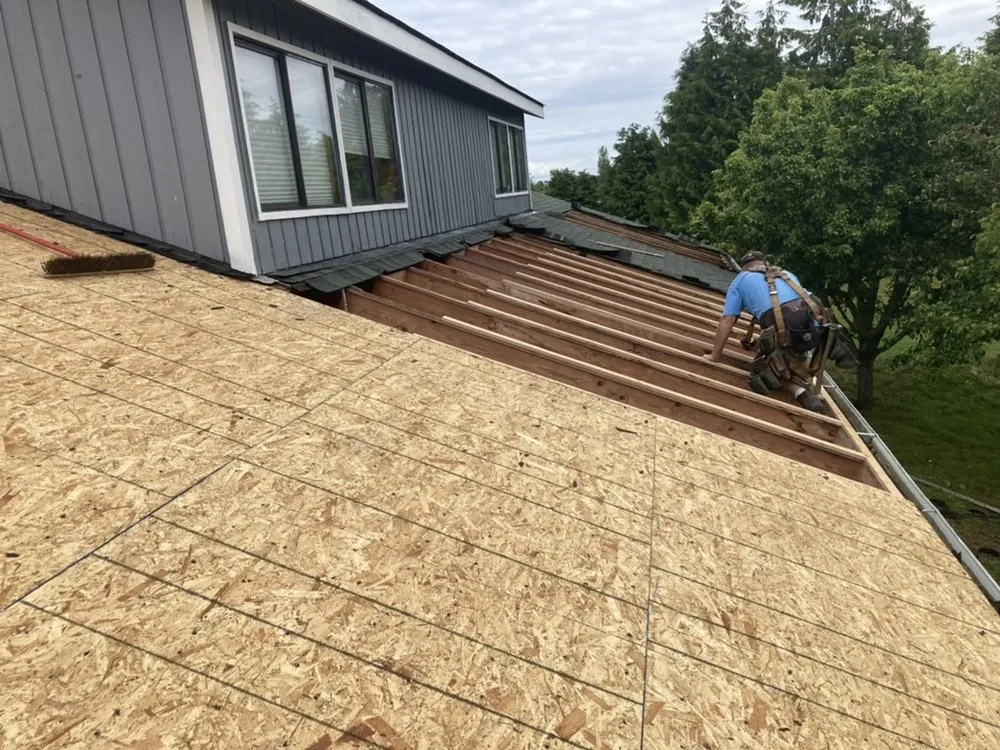 Slide of Peninsula Peaks Roofing