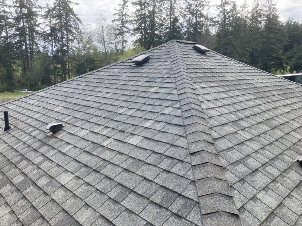 Slide of Peninsula Peaks Roofing