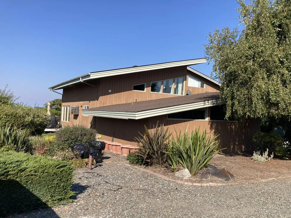 Slide of Peninsula Peaks Roofing