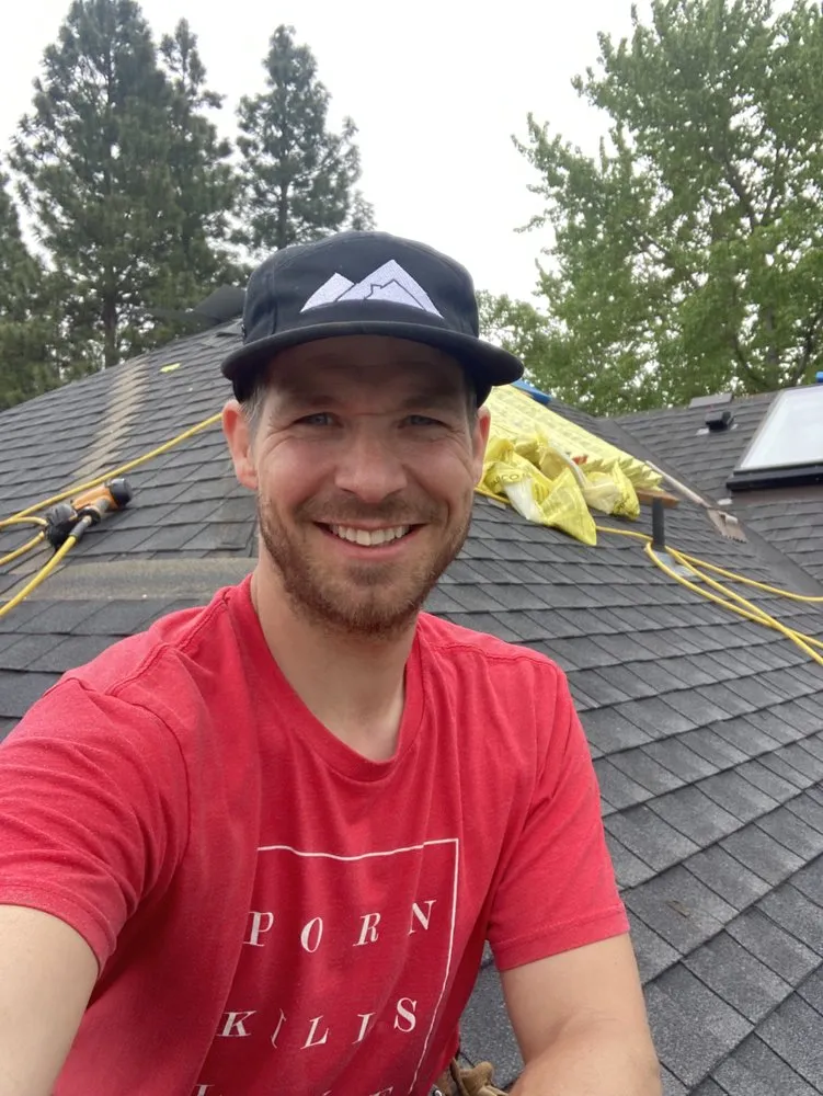 Slide of Peninsula Peaks Roofing