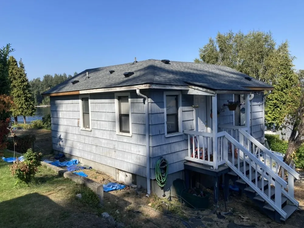 Slide of Peninsula Peaks Roofing